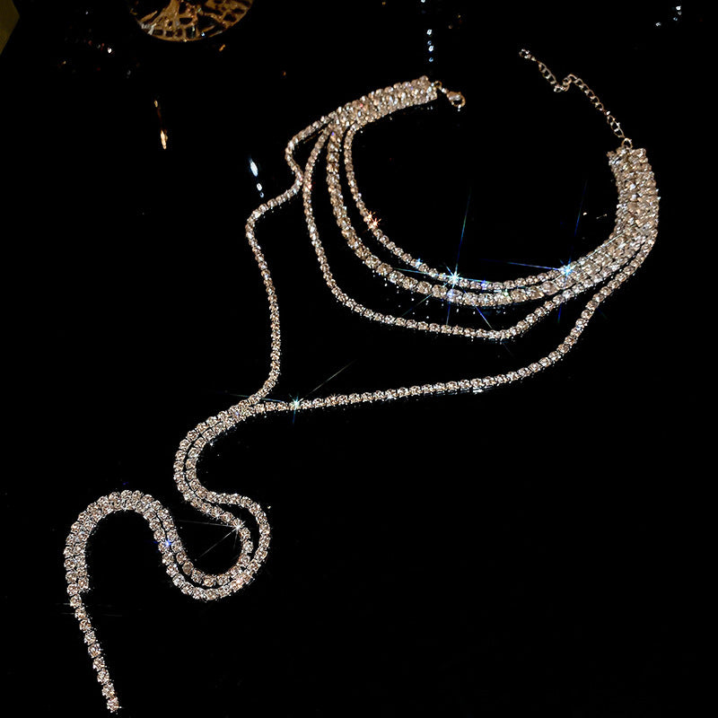 Diamond-encrusted chain, multi-layer tassel necklace